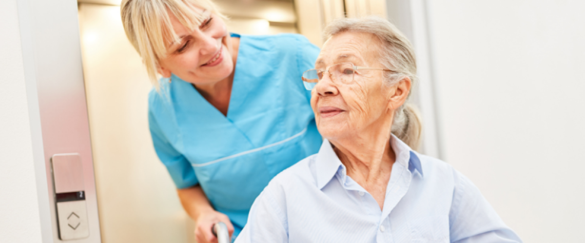 Image of nurse and patient